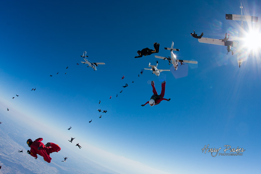 Big way skydiving formation exit view from left trail plane, photo by Harry parker