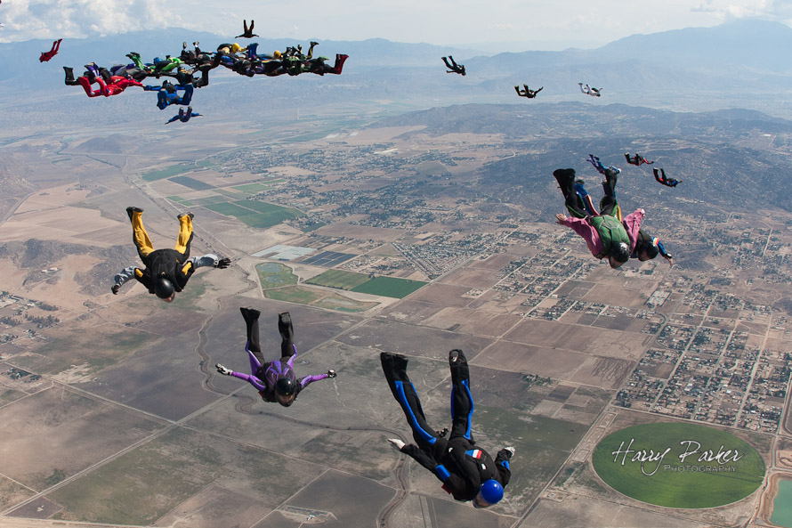 Skydivers breakoff formation and track away, photo by harry parker
